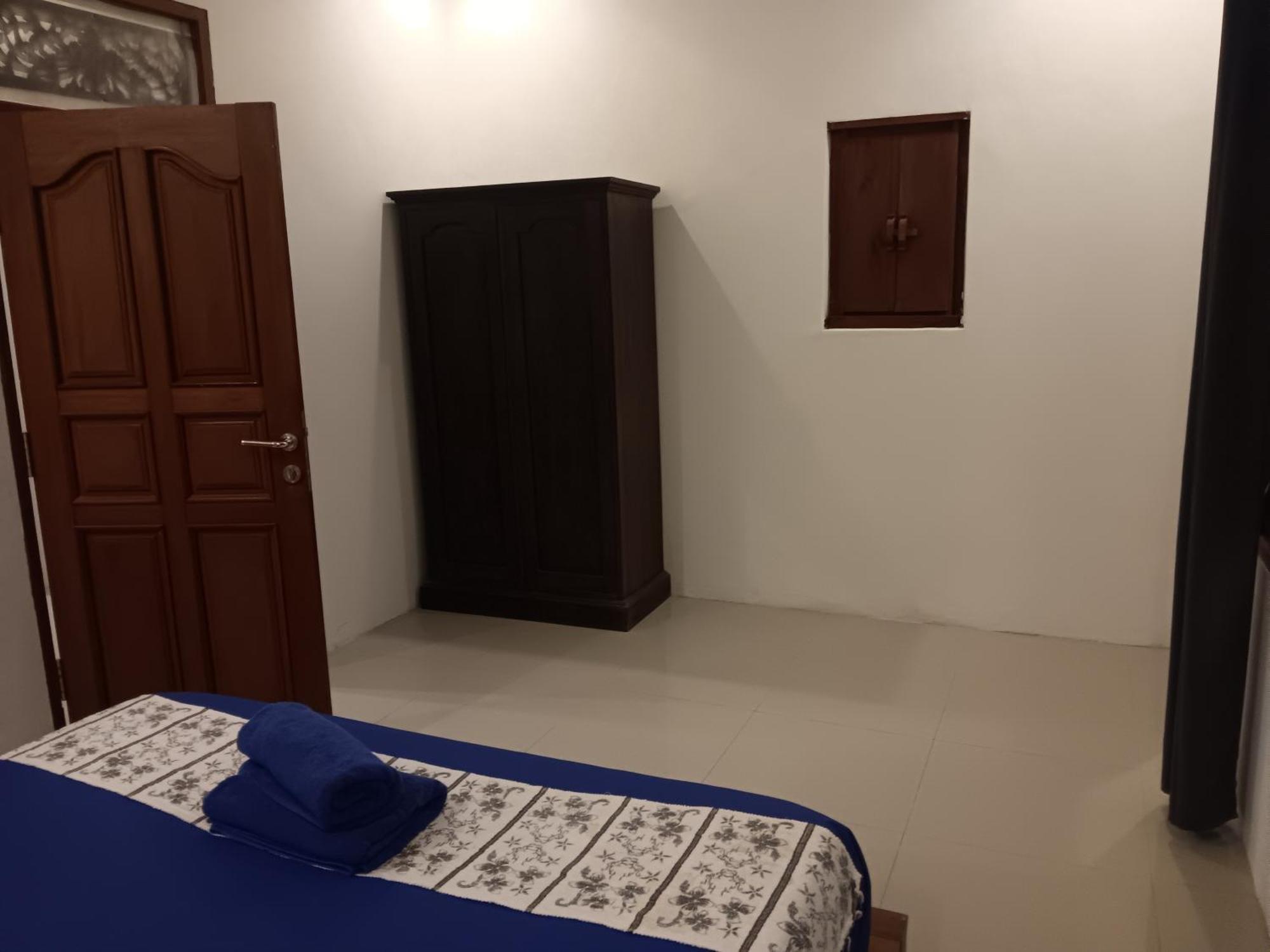 Adore Guesthouse Amed Cameră foto