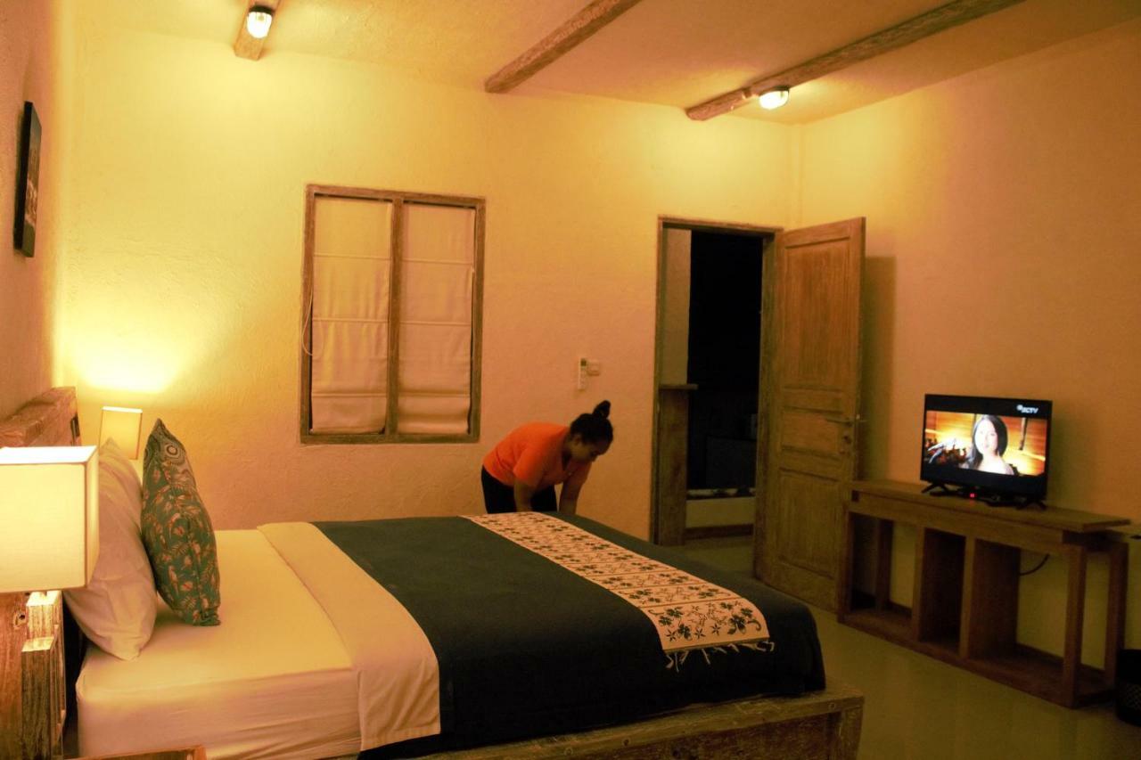 Adore Guesthouse Amed Exterior foto